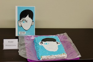 light blue book cover with face with one eye and black hair